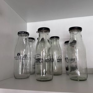 7 Bottles + 1 Glass
