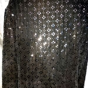 Black Sequence shrug