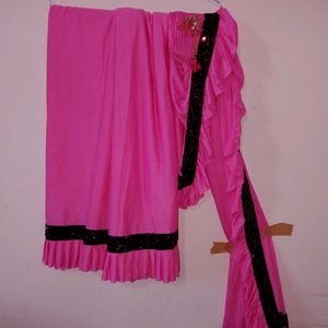 Pink raffuel saree with stitched blouse