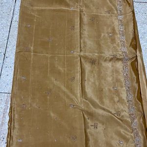 Beautiful golden satin silk hand embroidery saree