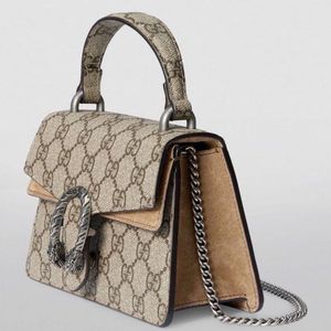 GUCCI- DAONUSUS TOP HANDLE BAG