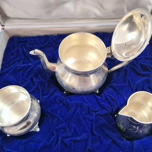 Antique Tea Set with silver polish