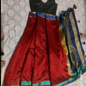 Maroon Saree With Sleevless Blouse