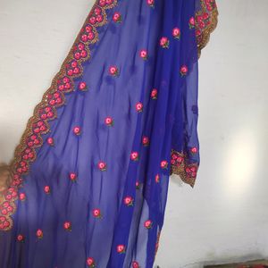 Blue Saree With Flowers Design