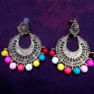 Round sep big or long ston earrings