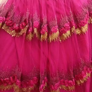 golden choli and dark pink ghaghra with duppatta