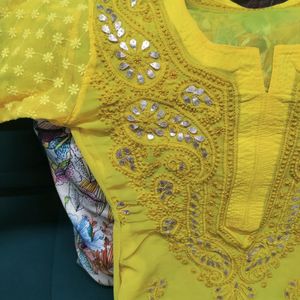 Yellow Chikankari Kurta And White Flared Palazzo