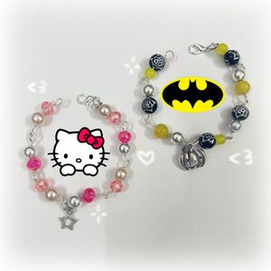 batman and hello kitty matching bracelets