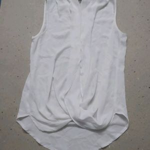 White Colour Top.it will reach worst and pressed.