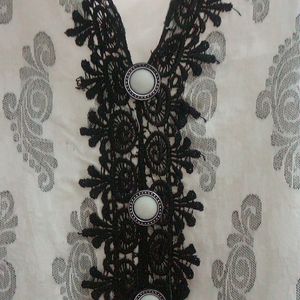 Transparent Lace designed white Kurti only needs ironing. Not much used just kept aside. No Flaws.