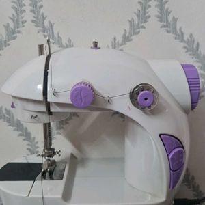 Mini Sewing Machine.