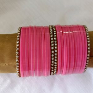 Pink Plastic Bangles Set .