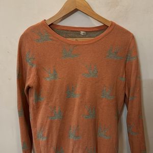 Orange Sweater With Silver Bird Print