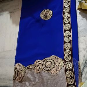 You Are Free To Offer Blue Saree With Broad Lace