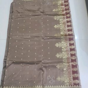 Mauve Color Saree With Golden Print Border