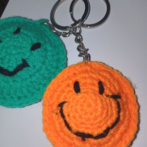 Pack Of Two Smiley Keychain Green And Orange