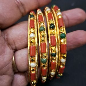 Beautiful coral and gold bangles Sz 2.8