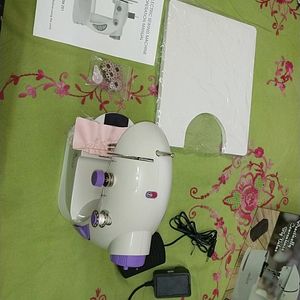 Brand new Akiara 4 in 1mini sewing machine with table