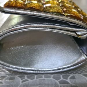 Silver Clutch with golden stones