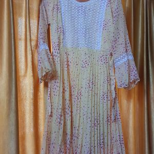 Yellow Kurti With Pink Details And White Chamkas