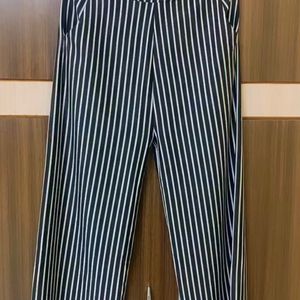 Black stripes pant with pockets on both sides..