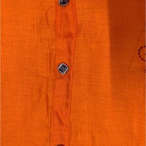 HANDWORK ORANGE SLEEVELESS KURTI