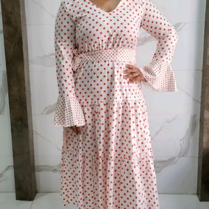 Three tiered orange polka print white dress