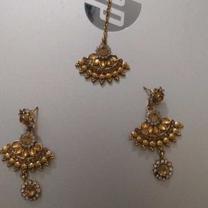 Golden Set Of Earrings And Mangtika