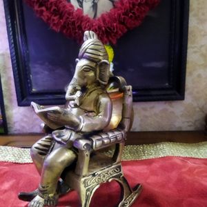 Ganesh Sitting On A Rocking Chair Idol