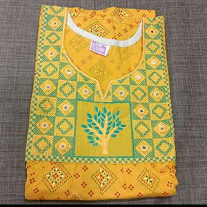 combo of rama green and yellow cotton gown with Beautiful embroidery