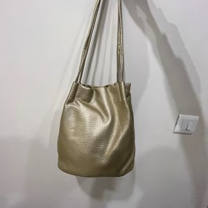 Golden Big Potli Shaped Bag