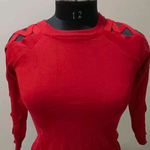 top in red colour with designer sleeves