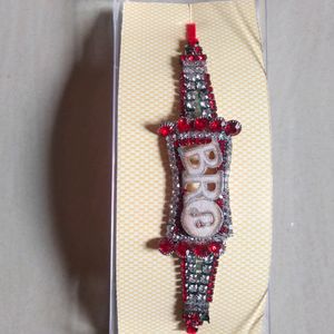 White & Red Stone Rakhi For Brother