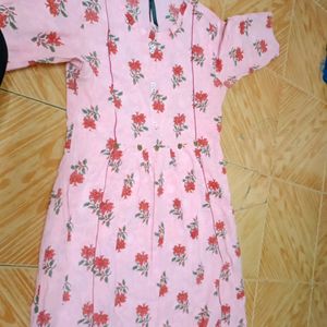 Simple light pink coloured L size kurti. with little colour faded