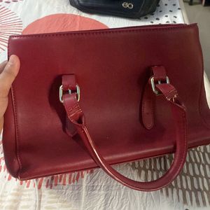 red hand bag