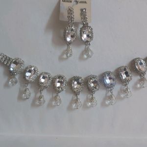 diamond necklace and earrings