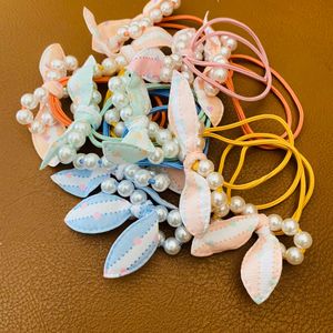 6 Pairs Of Pearl Bow Rubber Bands