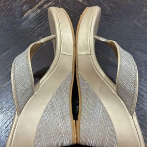 Khadim’s Golden Shimmery Wedges