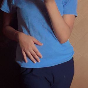 A Blue Shoulder Designed Top