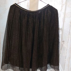 Shining black skirt with gilter effect