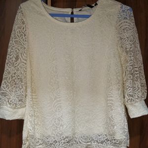 An Off White Lace Top