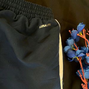 Adidas blue trackpants