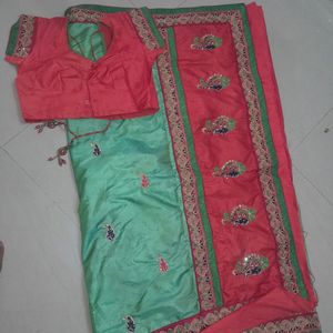 Parrot Green And Orrage Saree