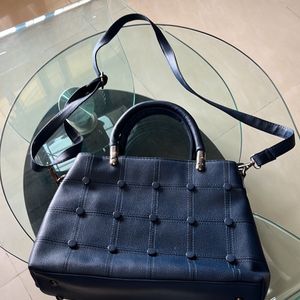 Elegant Blue Textured Spacious Handbag