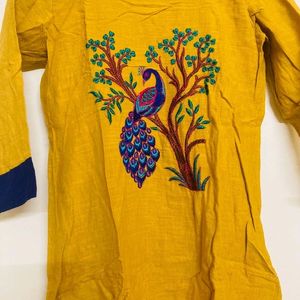 Mustard Yellow Peacock Embroidery Kurti