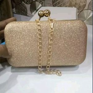 Trendy golden women's clutch With Chain