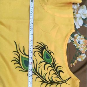 Yellow Morpankh Print Kurti With Tie Knots At Wais