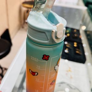 A Cute Water Bottle With Straw