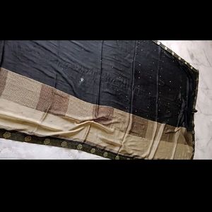 pretty olive black saree.