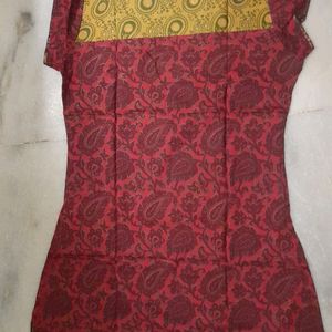 New kurti ....maroon colour printed pure cotton...cap sleeves...Round neck...no flaws...own factory made